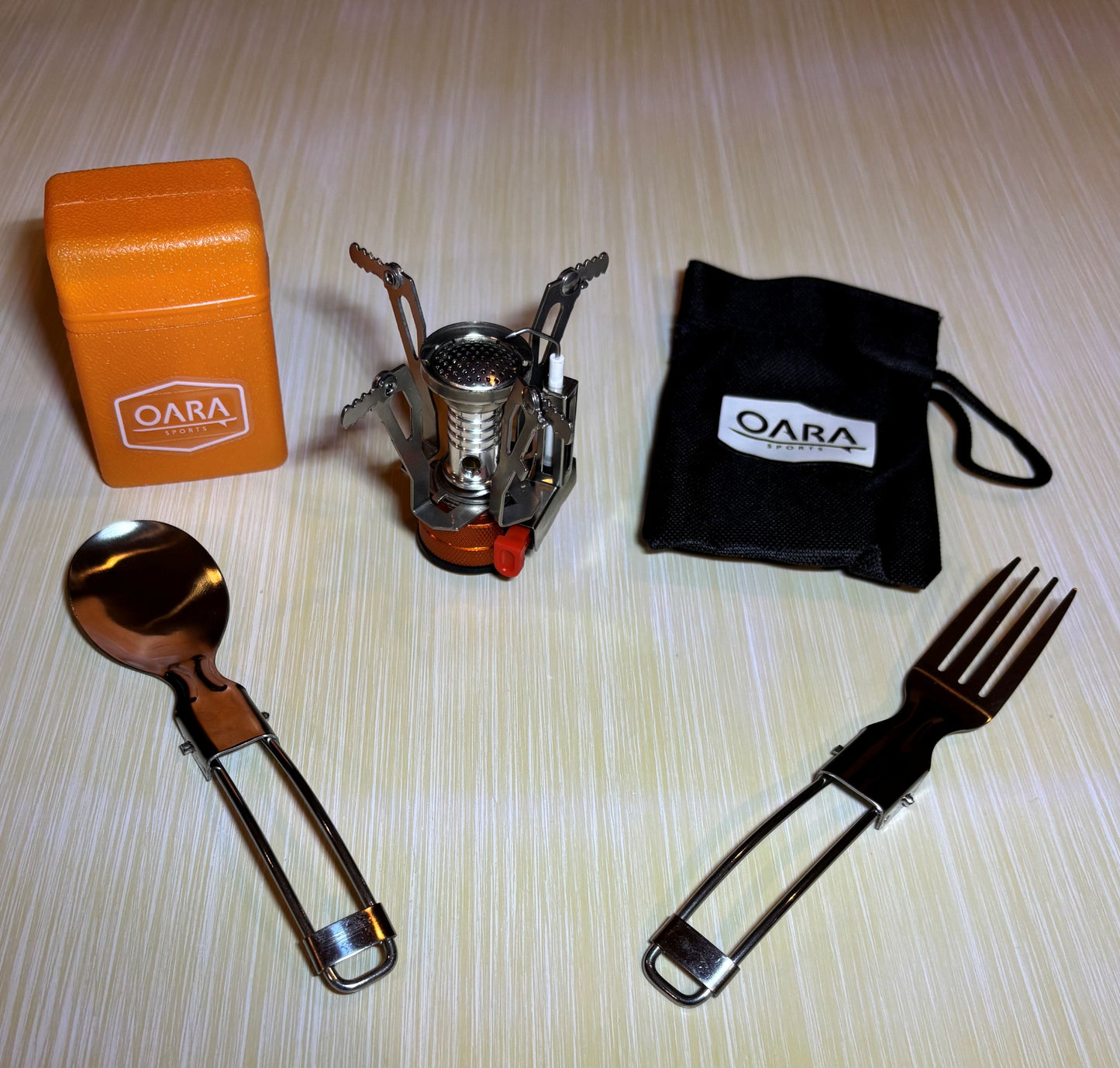 OARA Sports camping stove, utensils, and carrying pouch.