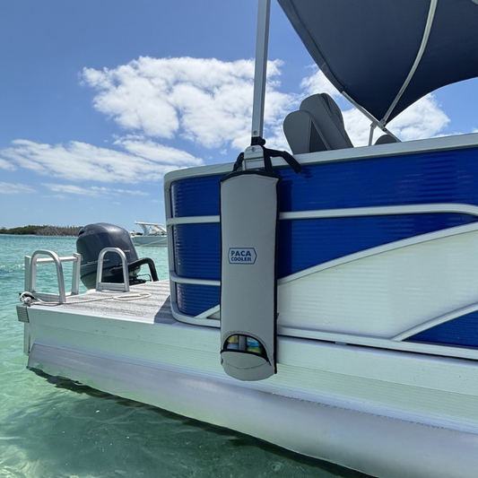 Silver Paca Cooler attached to a blue pontoon boat beached at Keewaydin Island in Florida near Marco Island, FL.
No need to get out of the water for your next beverage at the sandbar.
