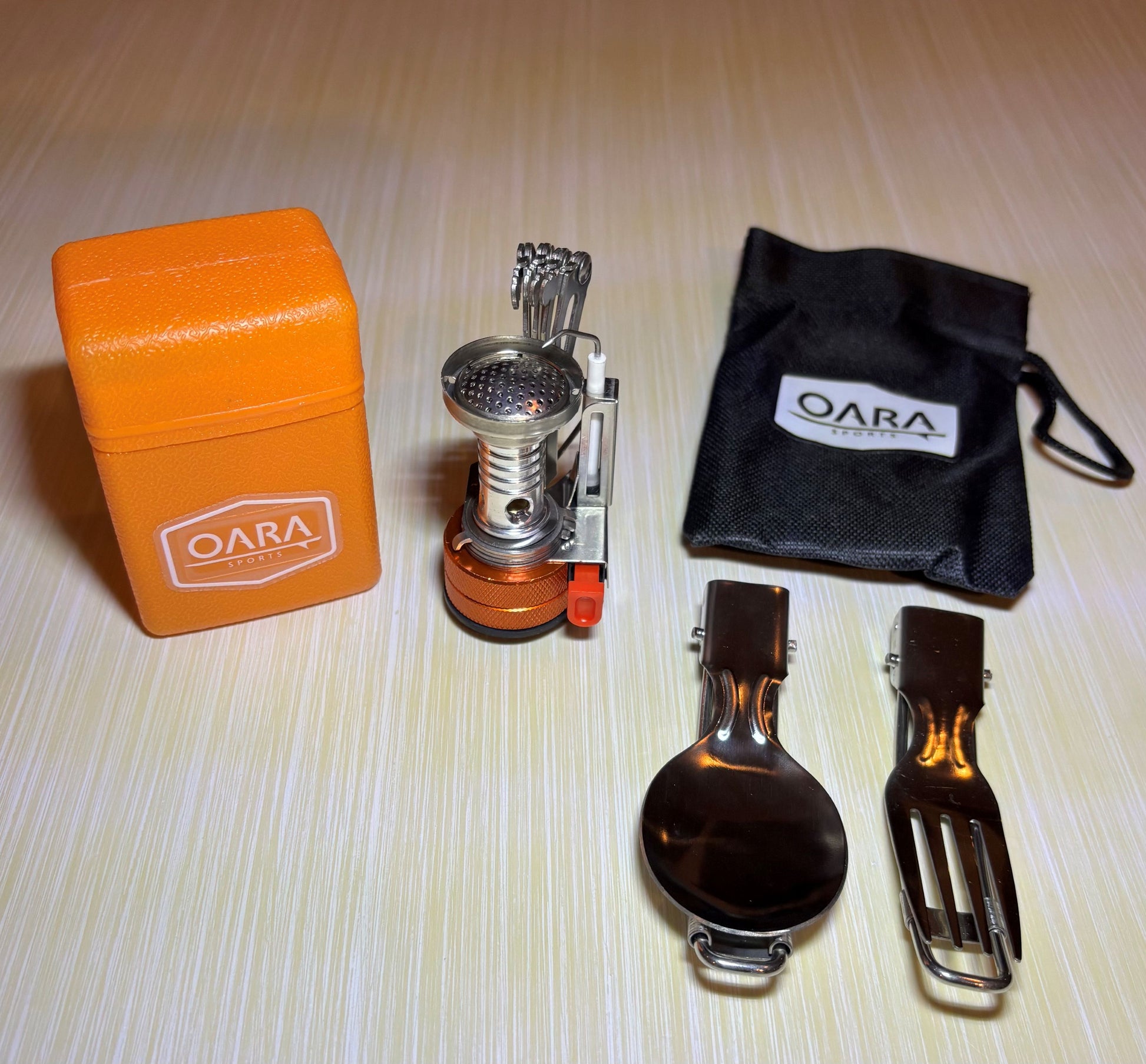 OARA Canister Mounted Pocket Camp Stove with Utensils. Now available at Recreational Innovations.