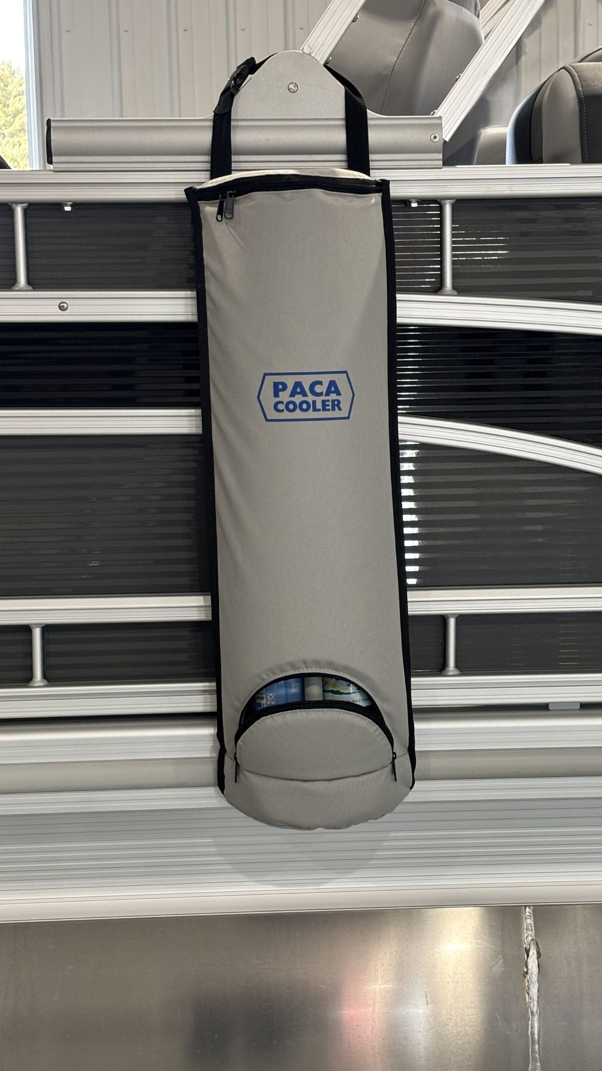 With an adjustable strap with a clip, the Paca Cooler can hang on boats railings, brackets, cleats, poles, etc. making it the perfect pontoon boat cooler.